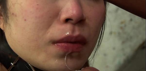  Collared Asian endures rough fingering and a nipple torture